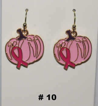 Pink pumpkin earrings with a pink ribbon