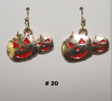 Pumpkin-shaped earrings with red faces