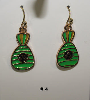 Green and gold earrings with a black center