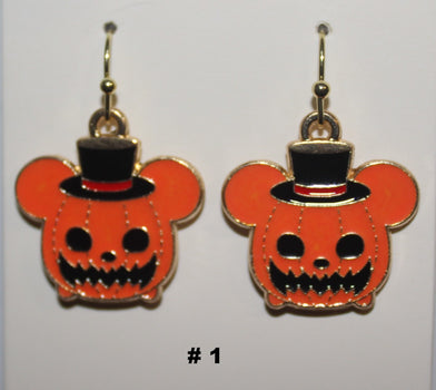 Halloween-themed earrings with jack-o'-lantern design background