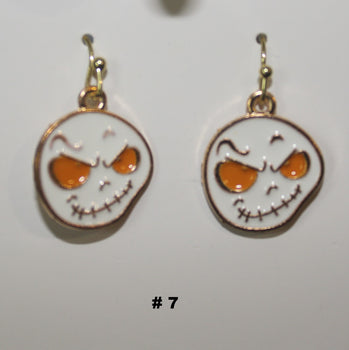 Pair of handmade ghost head earrings with skull design