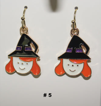 Witch themed handmade earrings with black hats and orange hair