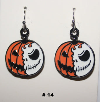 Pair of Halloween-themed earrings with pumpkin and skull design