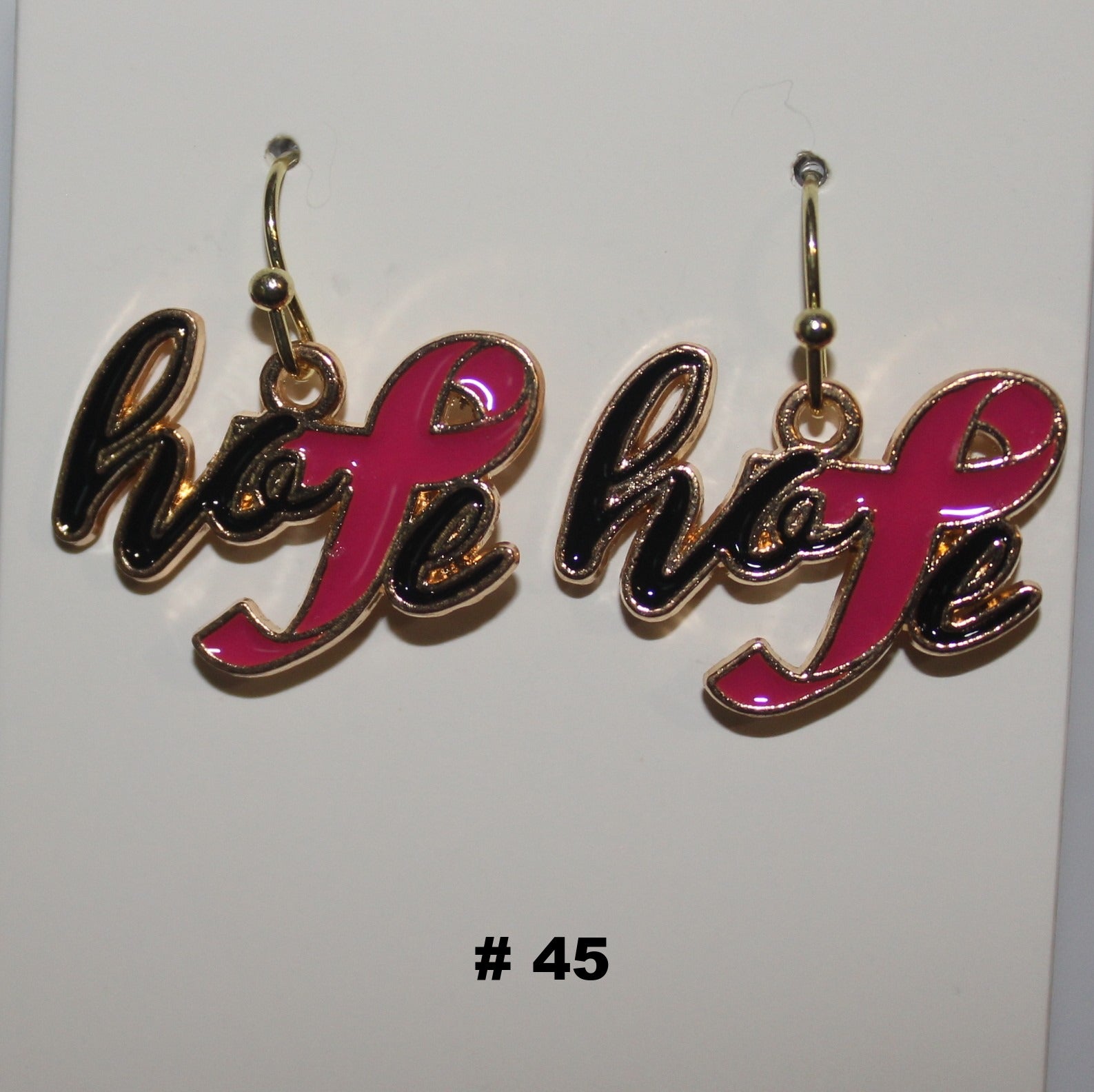 Pair of hope handmade earrings with pink ribbon design 