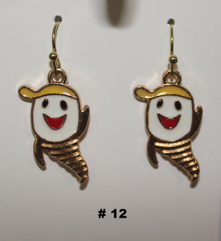 Pair of tooth shaped handmade earrings with gold accents 