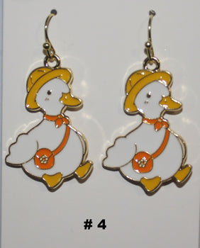 Duck-shaped earrings with a yellow hat and orange bag