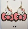 Hello Kitty earrings with pink bows 