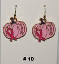 Pink pumpkin earrings with a pink ribbon 