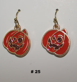 Pair of earrings with red and gold design 