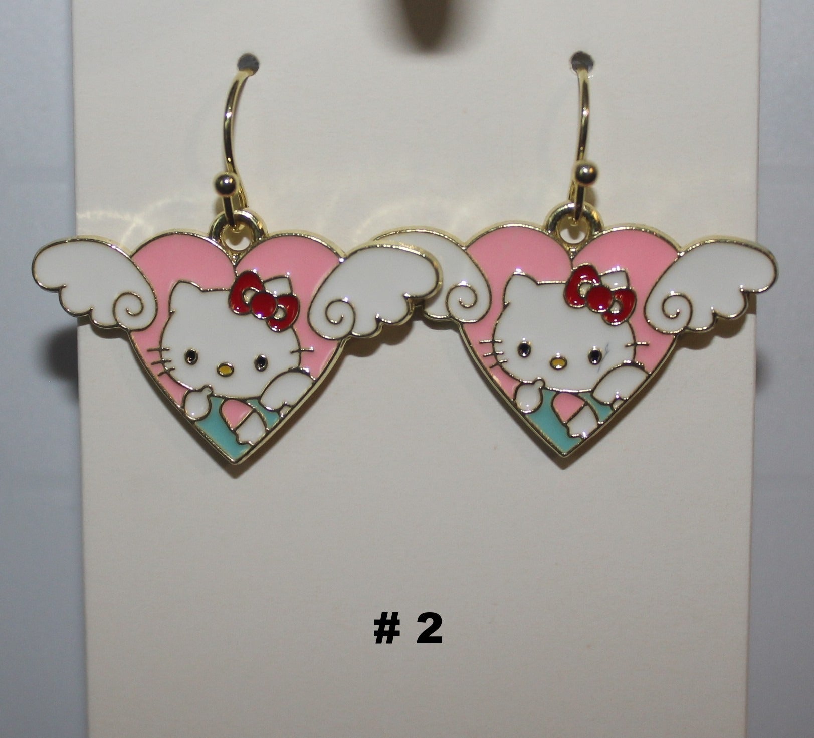 Heart-shaped earrings with a cartoon character 