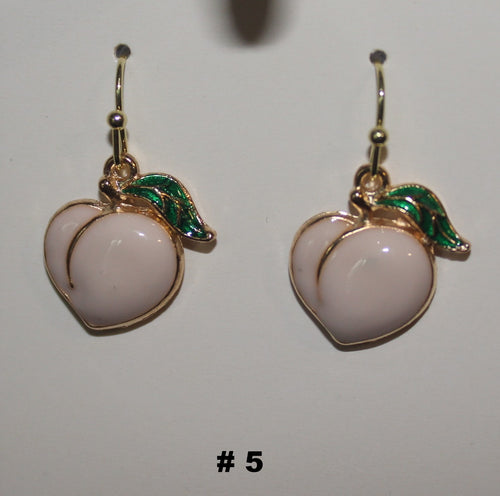 Pair of peach-shaped earrings with gold and green accents 