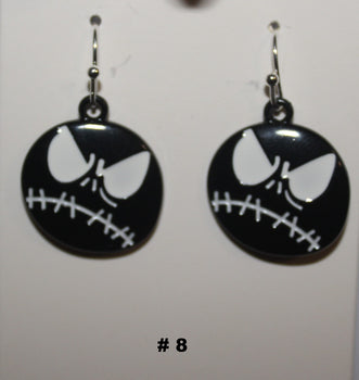 Black and white skeleton face earrings 