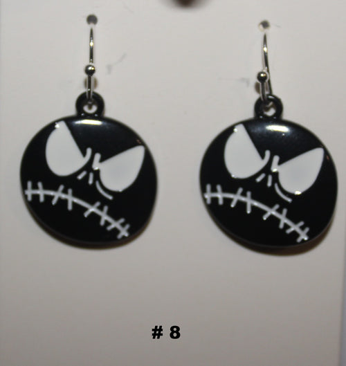 Black and white skeleton face earrings 