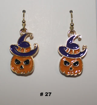 Halloween-themed pumpkin earrings with witch hats 