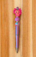 Colorful pen with a cartoon character top 