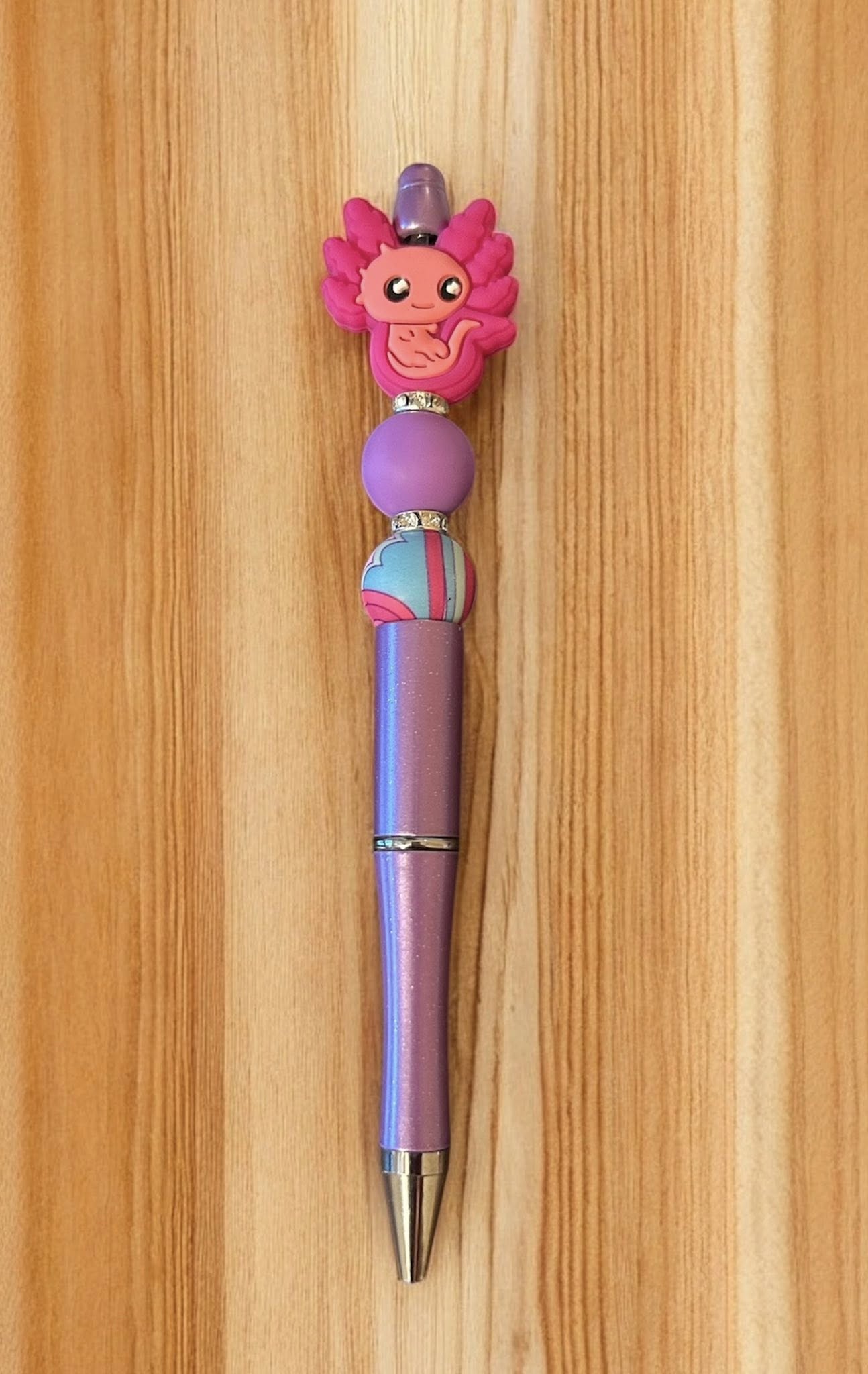 Colorful pen with a cartoon character top 