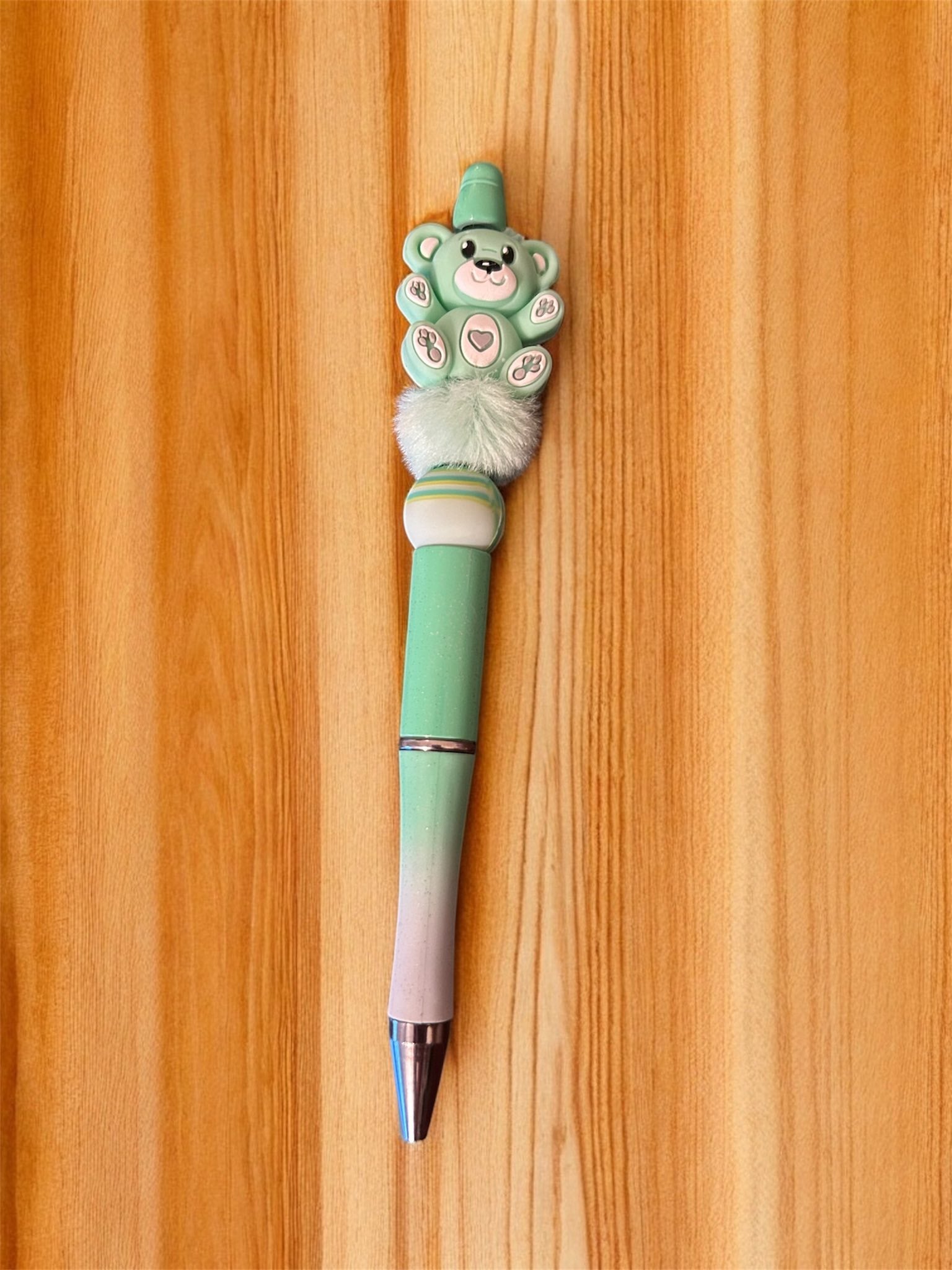 Decorative pen with a teddy bear design