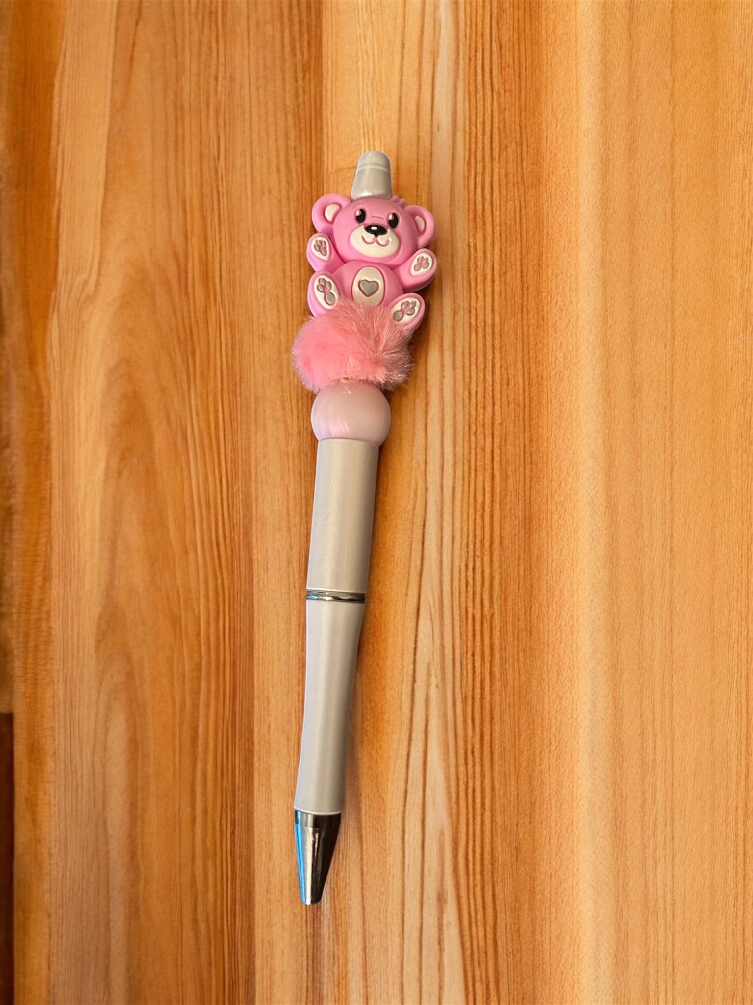 Decorative pen with a teddy bear design