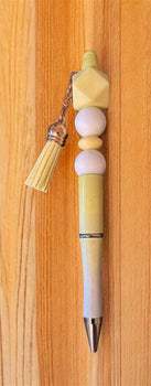 Pen with decorative elements 