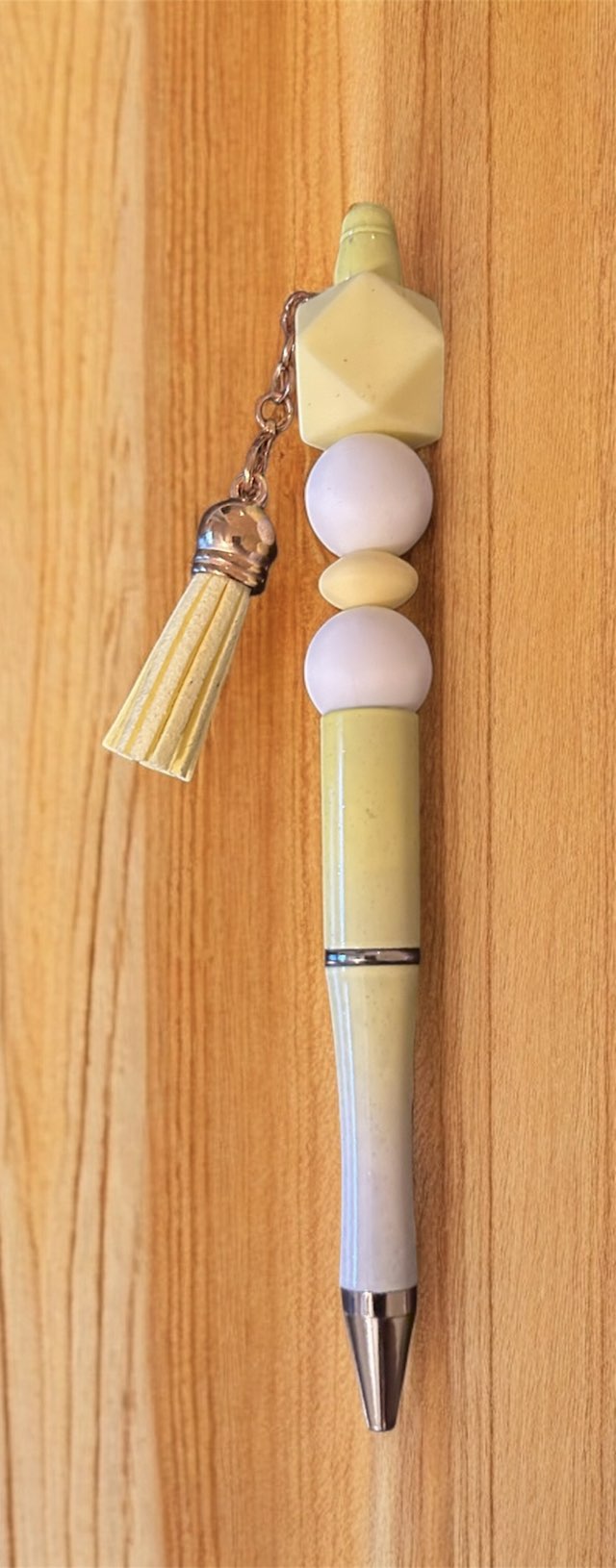 Pen with decorative elements 