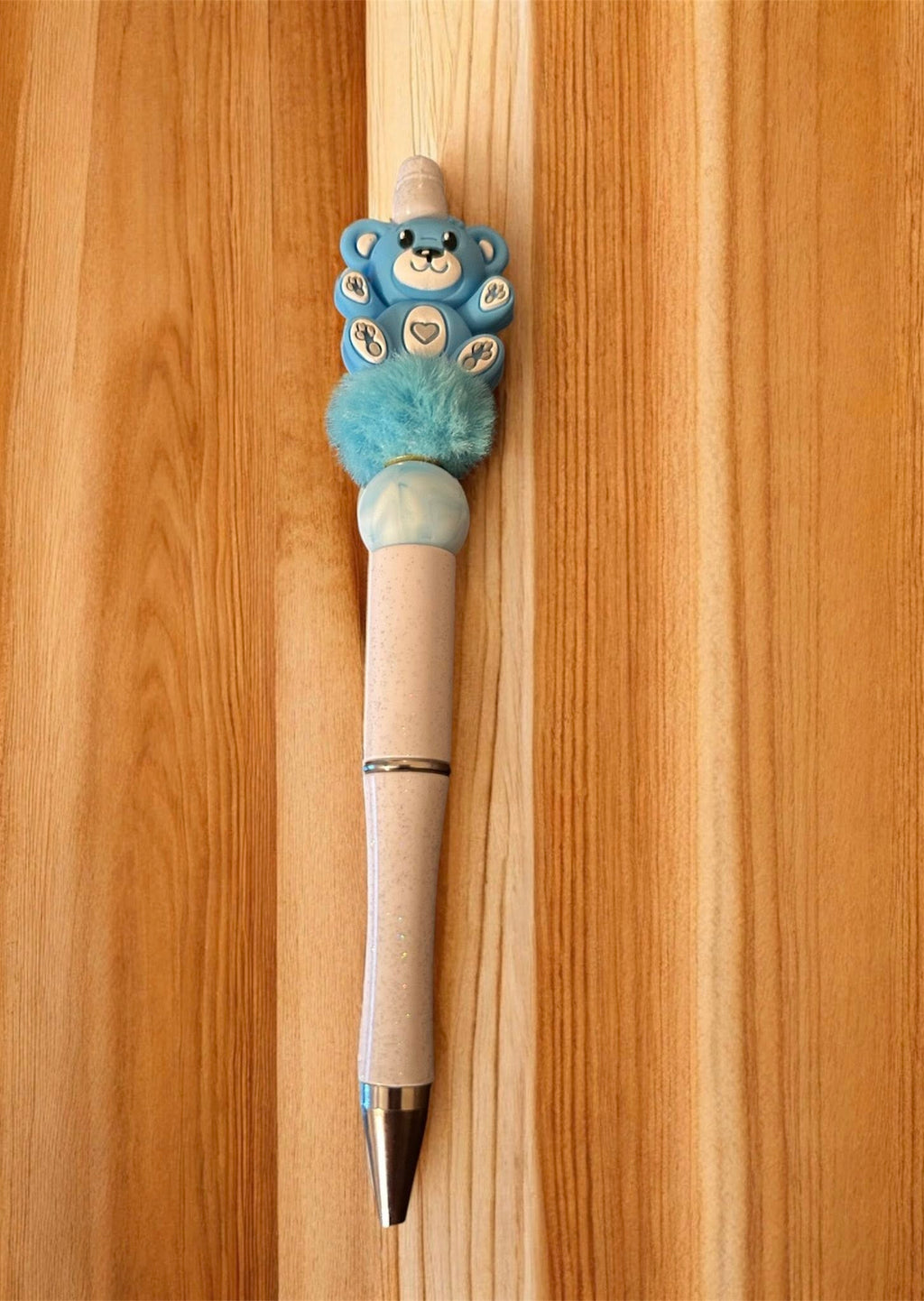 Decorative pen with a teddy bear design