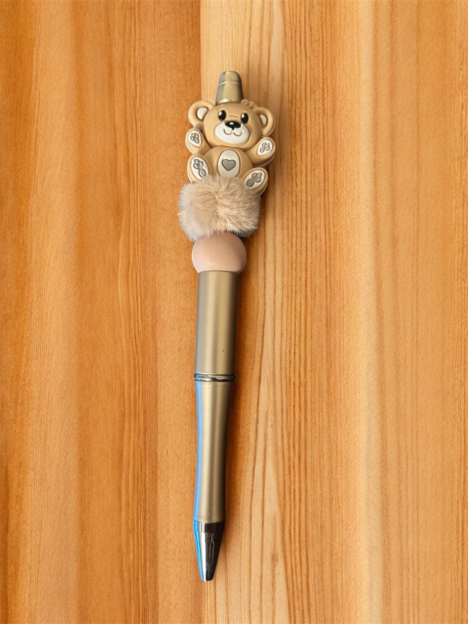Decorative pen with a teddy bear design 