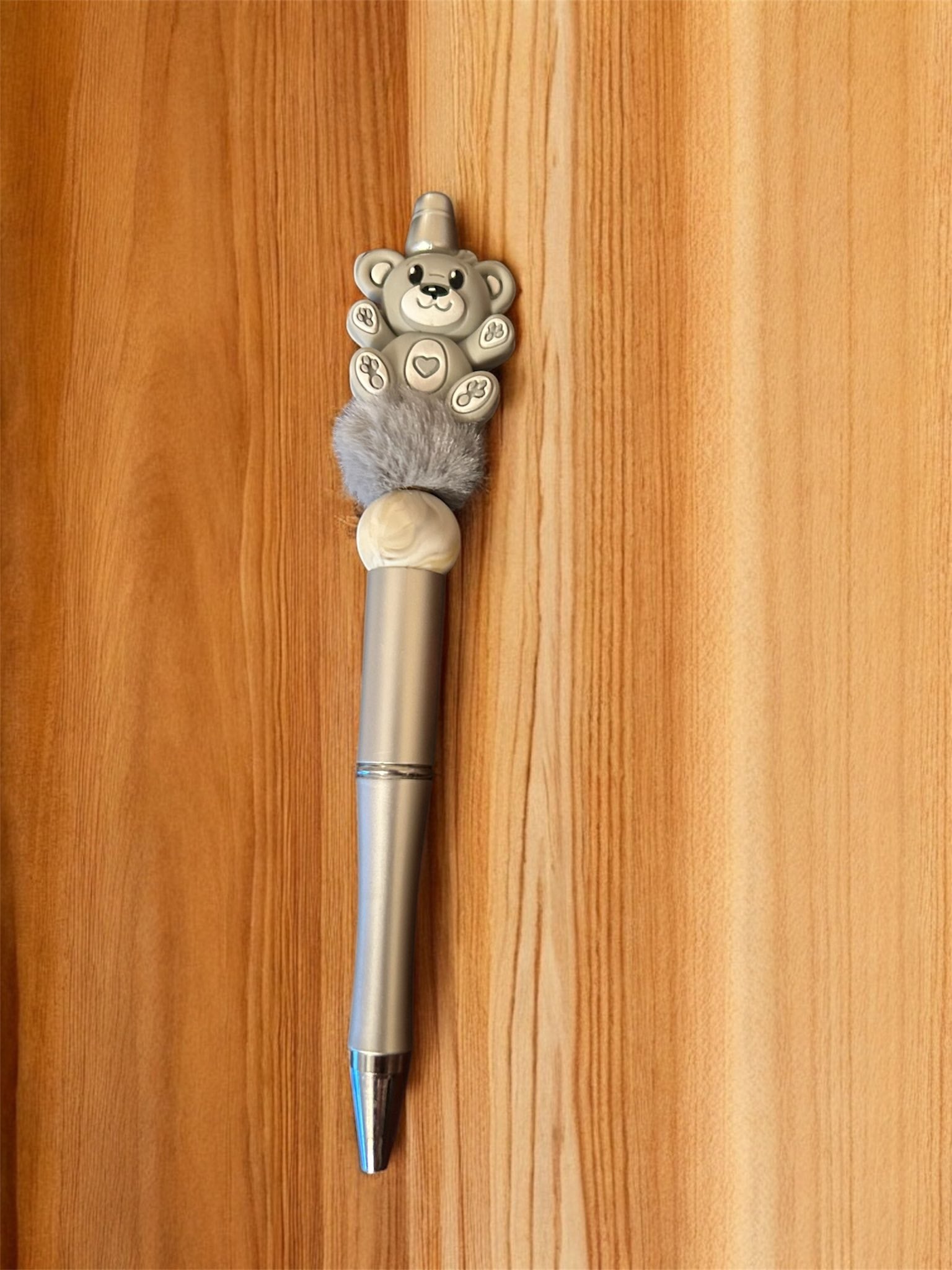 Decorative pen with a teddy bear design 