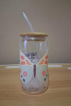 Clear glass jar with butterfly designs, wooden lid and straw 
