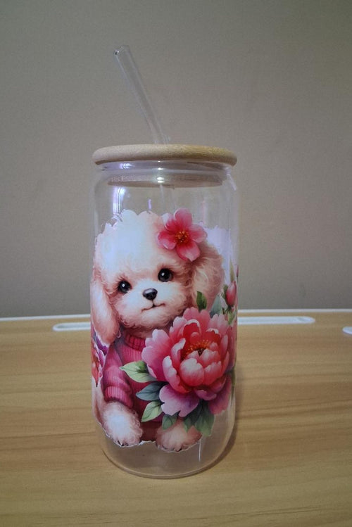 Glass tumbler with a bear and flower design 