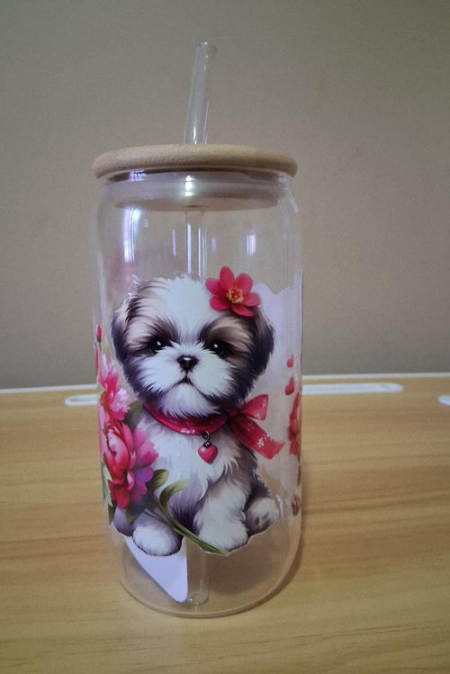 Glass tumbler with a bear and flower design 
