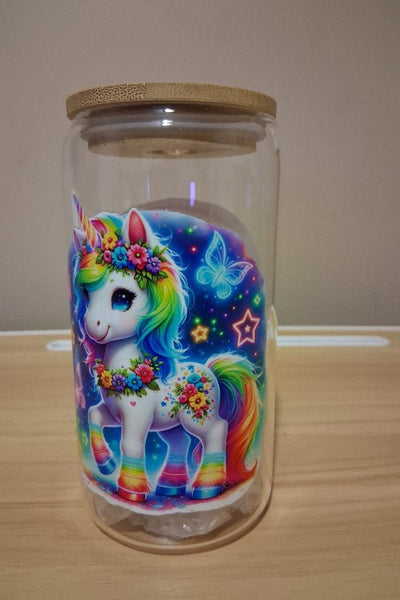 Glass cup with colorful rainbow and unicorn design
