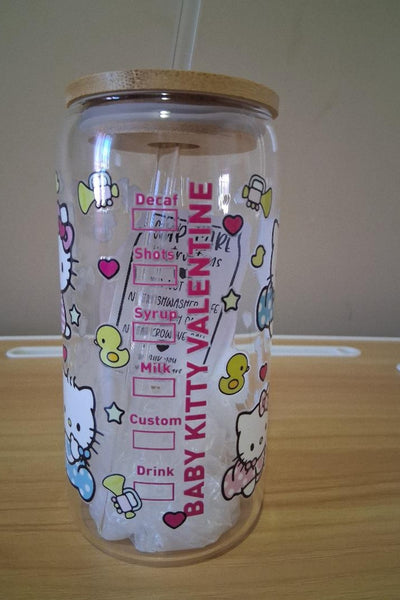 Clear tumbler with bamboo lid and straw featuring Hello Kitty branding 