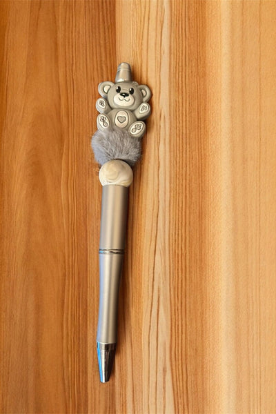 Decorative pen with a teddy bear design