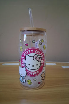 Clear tumbler with bamboo lid and straw featuring Hello Kitty branding 