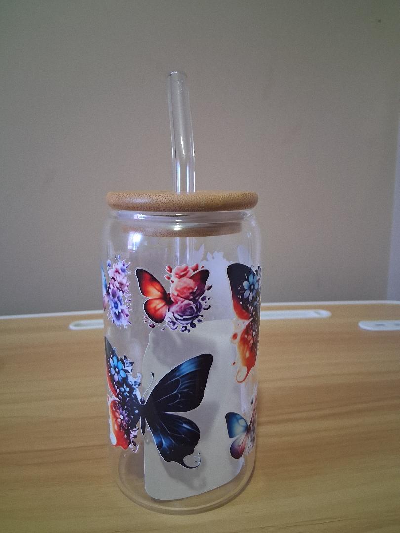 Clear tumbler with floral and animal design