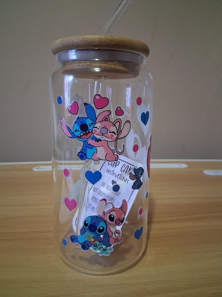 Clear tumbler with cartoon character design and heart patterns