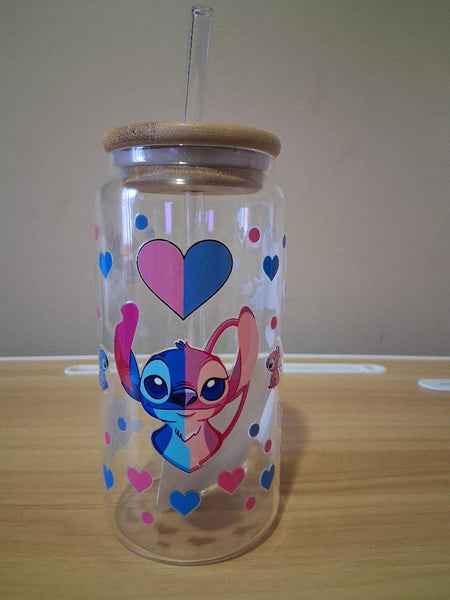 Clear tumbler with cartoon character design and heart patterns 