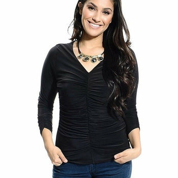 Plus size long sleeve black top with statement necklace